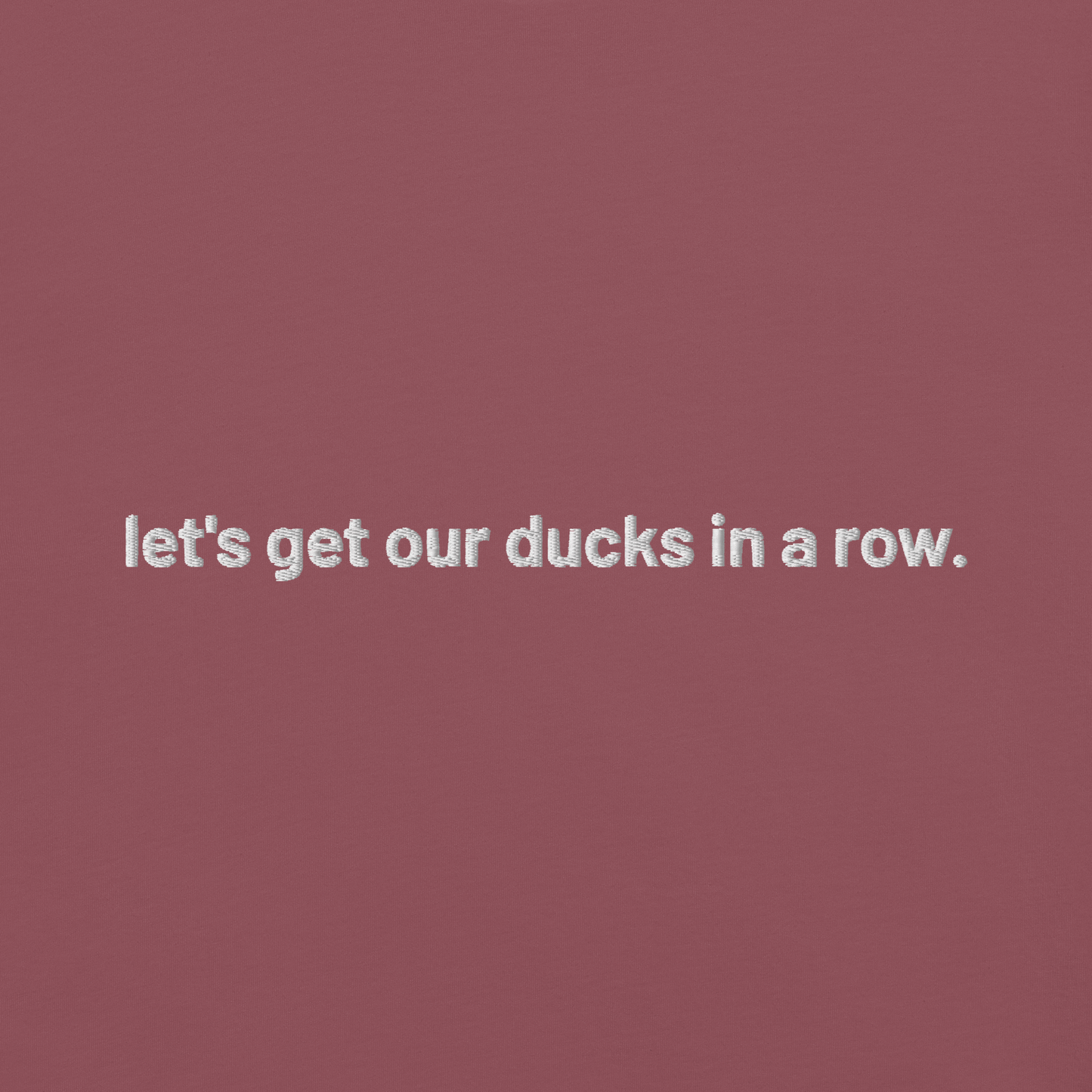 'let's get our ducks in a row.' embroidered t-shirt